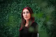 Laura Loomer & Charlie Kirk Face Legal Reckoning Over Alleged Voter Intimidation Plot