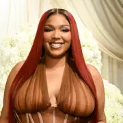 Lizzo's Stunning Weight Loss Transformation: Singer Shows Off Incredible Body in Gold Bikini