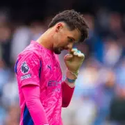 Man City Plot Sensational Double Goalkeeper Swoop: Trafford & Donnarumma in Shock Transfer Raid