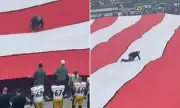 NFL Fans Spot Bizarre Intruder Crawling Across US Flag During Jets Halftime Show | Daily Mail