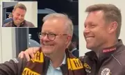 PM's Pitch Invasion: Anthony Albanese Snaps Selfie with AFL Legend Sam Mitchell