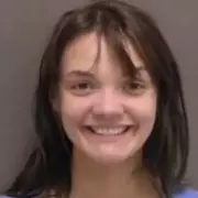 Smirking Mugshot: Woman Grins After Attempting to Kill Boyfriend in Car Inferno