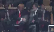 Trump and Elon Musk's Awkward Handshake: Inside the Tense Exchange at Influential Right-Wing Commentator's Funeral