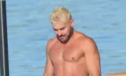 Zac Efron Debuts Shocking Bleached Blonde Hair Transformation During Netflix Appearance in Italy | Daily Mail