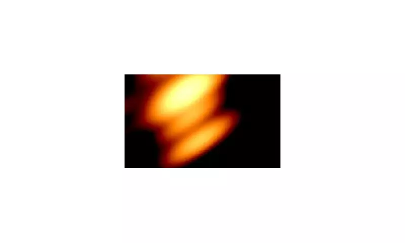 Cosmic Dance Revealed: Scientists Capture Black Holes Circling in Historic First
