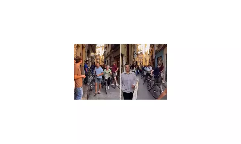 Spanish Fury: Locals Surround Tourists in Heated Confrontation Over Cycling in Pedestrian Zone