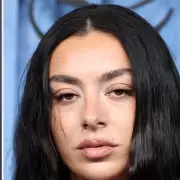 Charli XCX Throws Subtle Shade at Taylor Swift's 'Tortured Poets Department' in Fiery Social Media Exchange