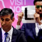 Comedian's Savage Stunt Leaves PM Red-Faced: Rishi Sunak's Awkward Photo Op Exposed
