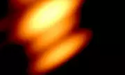 Cosmic Dance Revealed: Scientists Capture Black Holes Circling in Historic First