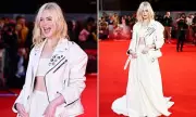 Elle Fanning Stuns in Chic White Crop Top During Badlands Filming Break