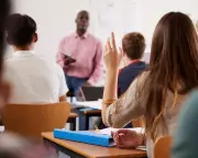 Former Home Secretary Backs Radical Immigration Plan: Skilled Migrants to Train British Workers