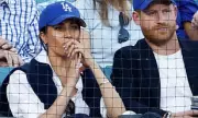 Harry and Meghan's Cryptic Mirror Message Sparks Royal Speculation During Dodgers Appearance