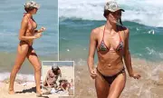 Indiana Clinton Flaunts Incredible Figure in Tiny Bikini During Bondi Beach Day With Sister