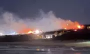 Inferno Engulfs Sydney's Maroubra Beach: Dramatic Blaze Sends Smoke Billowing Across Eastern Suburbs