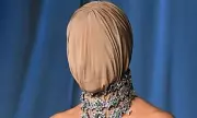 Kim Kardashian's Masked Marvel: SKIMS Mogul Stuns in Futuristic Gown at Academy Museum Gala