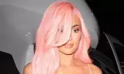 Kylie Jenner Stuns in Skintight Black Dress With Daughter Stormi at Star-Studded Event