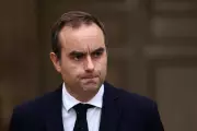 Macron Faces Political Firestorm as French Prime Minister Survives No-Confidence Vote