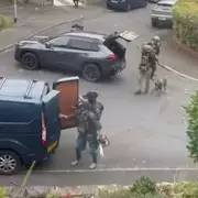 Manchester Armed Police Storm City Centre Building in Major Security Operation