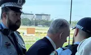 Mark Latham Escorted by Police from Randwick Racecourse in Dramatic Restaurant Confrontation