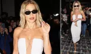 Rita Ora Stuns Paris in Daring Plunging White Gown During Fashion Week Arrival