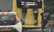 Shocking Bus Surfing Epidemic: Teenagers Risk Lives Clinging to Moving Vehicles in Broad Daylight