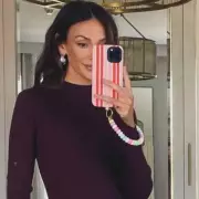 Shop Michelle Keegan's Stunning Burgundy Midi Dress That's Taking Over Instagram