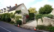 Tragedy in the Cotswolds: 49-Year-Old Woman Fights for Life as Police Investigate Death of 9-Year-Old Girl