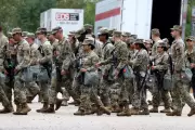 Trump's Government Shutdown Gambit: Military Pay Held Hostage in Budget Standoff