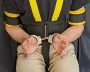 US Senators Demand Answers Over ICE's 'Disturbing' Full-Body Restraint Use