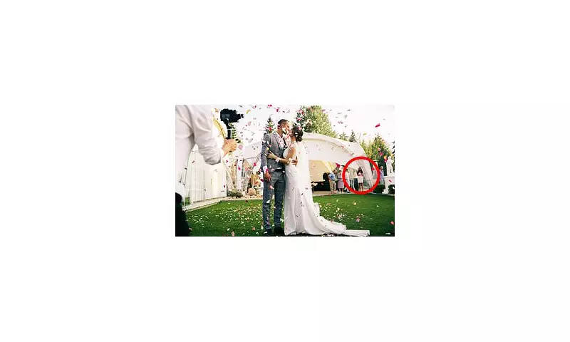 Bride's Shock as Stranger Found in Wedding Photos Months Later