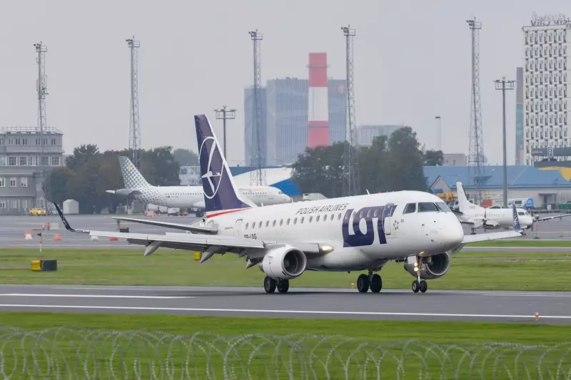 LOT Polish Airlines plane slides off runway at Vilnius airport in snow
