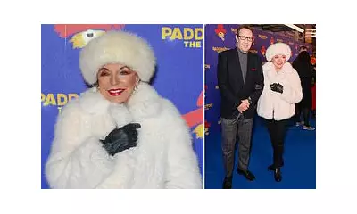 Joan Collins, 92, Stuns at Paddington Musical Premiere With Husband Percy Gibson