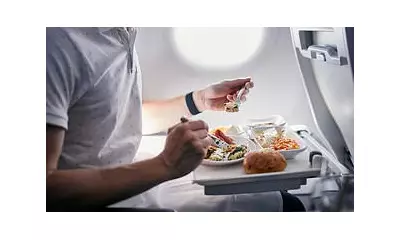 Passenger's Epic Meltdown Over 'Basic Flight Rule' As Seatmate Eats Before Takeoff