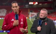 Anfield Eruption: Van Dijk's Touchline Fury at Rooney Ignites Champions League Drama