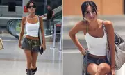 Angelina Censori Stuns in Camo Shorts at Sydney Airport