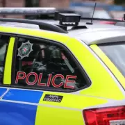 Armed Police Swarm Kilwinning Street, Urge Residents Indoors