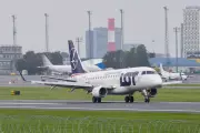 LOT Polish Airlines Plane Skids Off Runway at Vilnius Airport in Snow