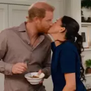 Prince Harry and Meghan Markle Share Kiss in Netflix Christmas Trailer