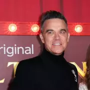 Robbie Williams Reveals Eyesight Struggle at Film Premiere with Family