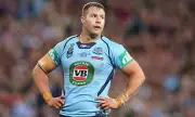 Rugby League Star Trent Merrin Faces Fraud Charges in Cryptocurrency Investment Scandal
