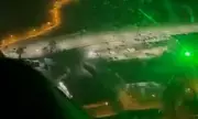 Shocking Moment Child, 9, Targets Passenger Jet With Green Laser - Pilots Nearly Blinded Mid-Flight