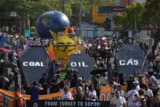 Thousands March in Belem as COP30 Climate Talks Reach Midpoint