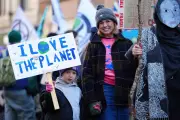 Thousands March in Glasgow for Largest Climate Rally Since COP26
