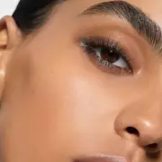 Victoria Beckham's Sparkly Brown Eyeliner is Her Festive Must-Have