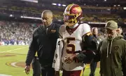 Washington Commanders Hold Breath as X-Ray Results Reveal Jayden Daniels' Elbow Injury Severity