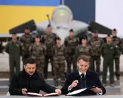 Zelenskyy & Macron Sign Fighter Jet Deal as Ukraine Faces €70bn Funding Crisis