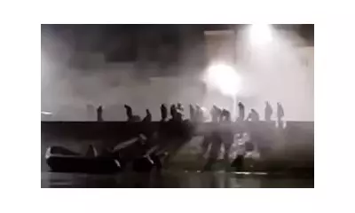 French Police Fire Tear Gas at Migrants Near Calais as 700 Boats Land in UK