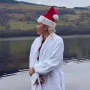 A Place in the Sun's Danni Menzies braves freezing Scottish loch in red bikini