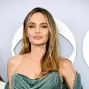 Angelina Jolie reveals mastectomy scars after 15 years in powerful plea for breast cancer screening