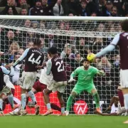 Arsenal's Title Hopes Dented by Aston Villa's 94th-Minute Heartbreaker